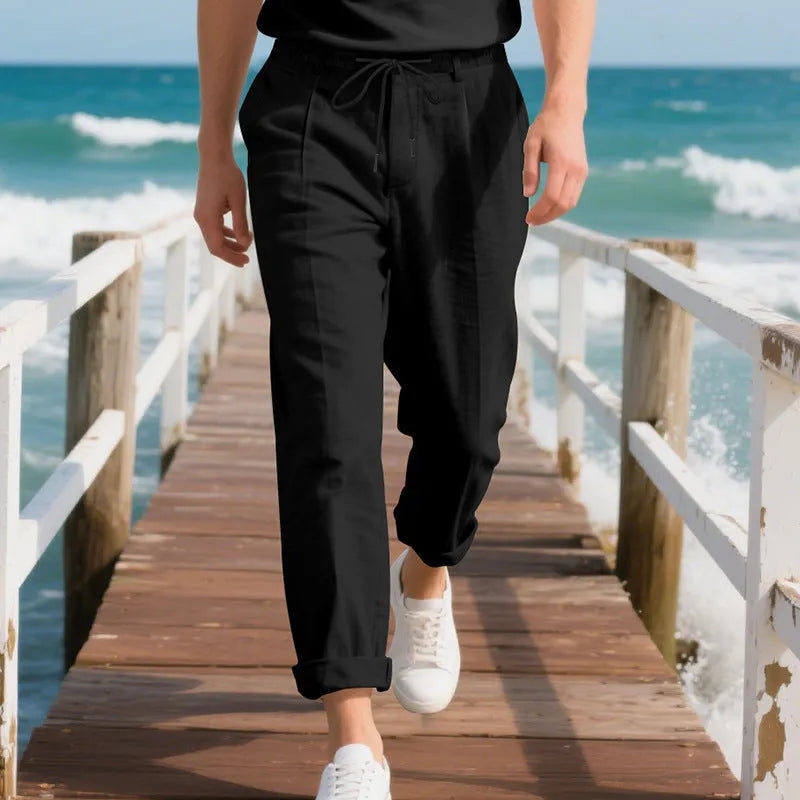Men's casual linen trousers in light khaki colour with drawstring waist and straight leg