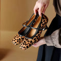 Women's black square toe stiletto ankle-strap shoes with horse hair upper and buckle closure