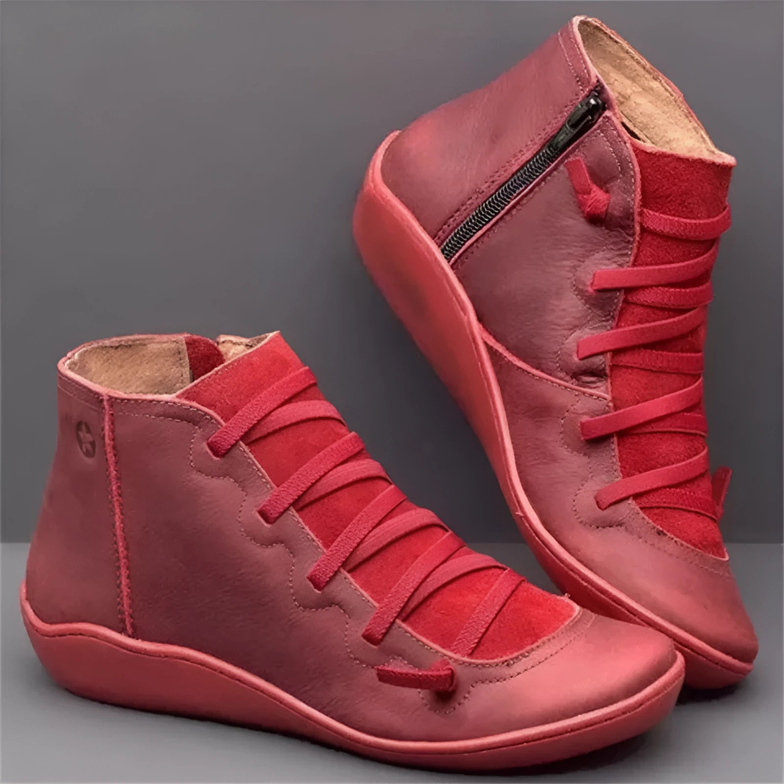 Women's black casual ankle booties with a flat wedge heel and round toe, made from PU with a rubber sole.