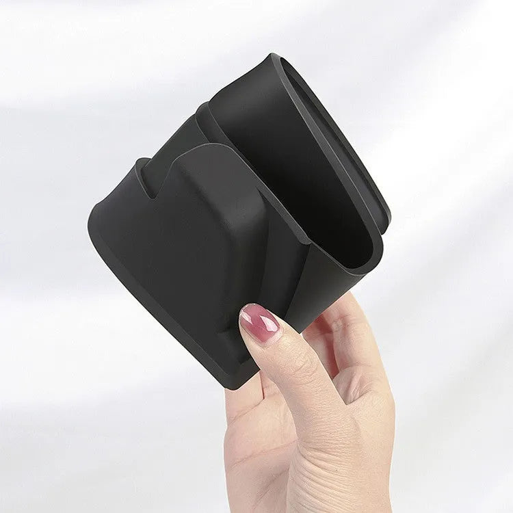 Black silicone glasses case mounted on Tesla Model 3 centre console