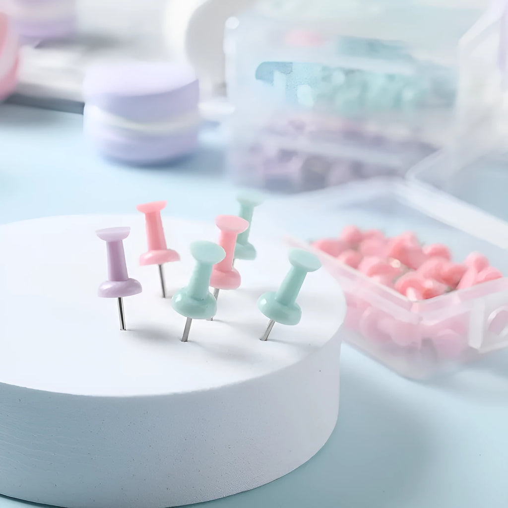 Box of plastic push pins in macaron colours - cherry blossom pink, mint green and lavender
