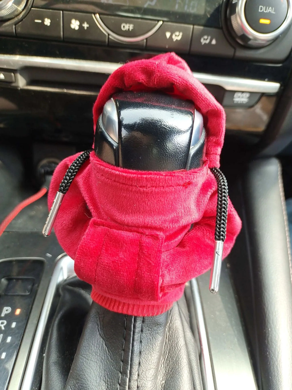 Pure cotton handmade gear lever cover in red, black, white, orange, pink, and peacock blue colours.