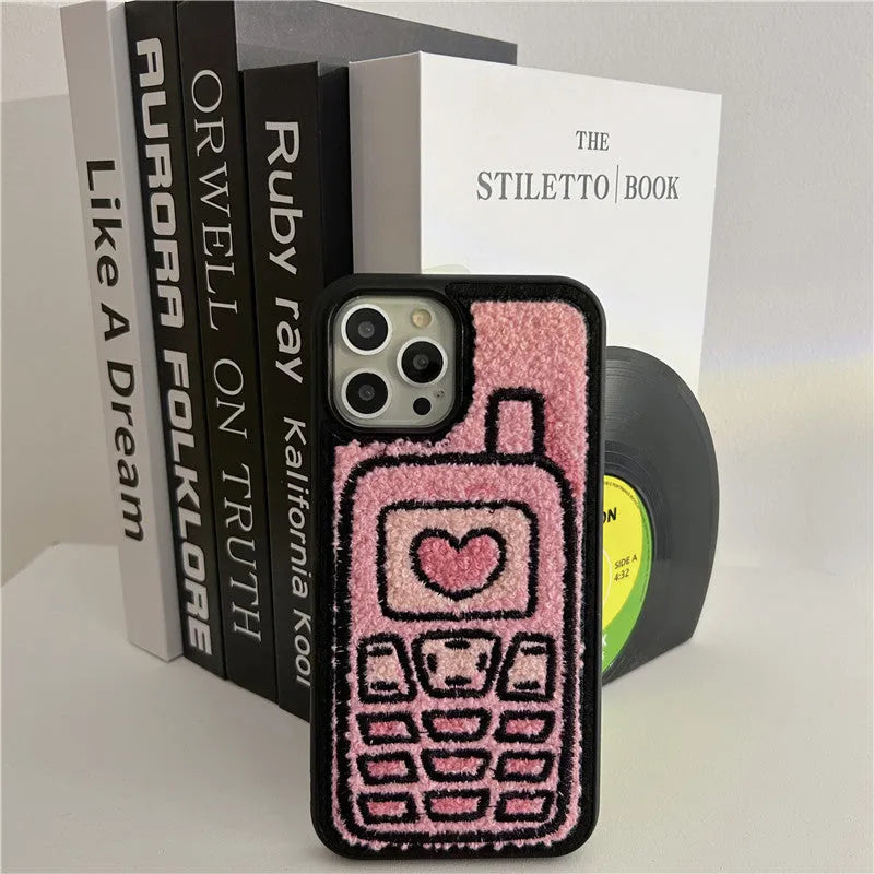 Pink TPU iPhone back case with a unique towel embroidery texture on the rear.