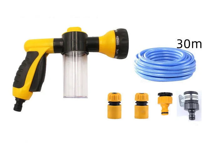 Green high pressure foam spray gun with adjustable nozzle for car washing and household cleaning.