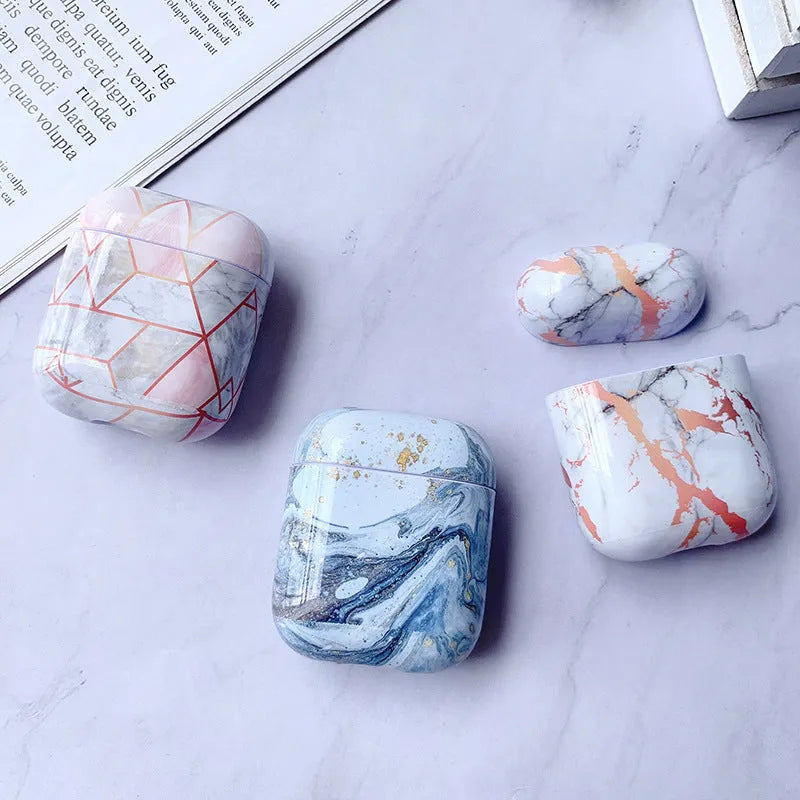 White Marble hard PC protective case fitted on an AirPods wireless charging case.