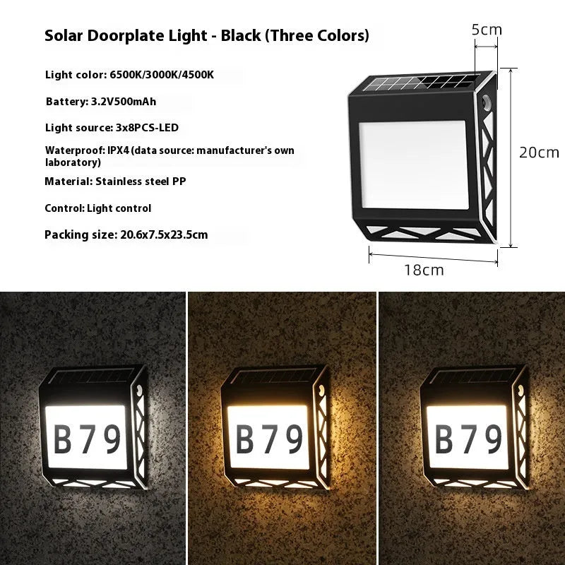 Black solar-powered doorplate light with LED illumination for house numbers measuring 180x50x200mm