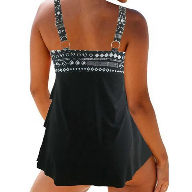 Plus-size women's split swimsuit in picture colour with double shoulder straps and a decorative bow.