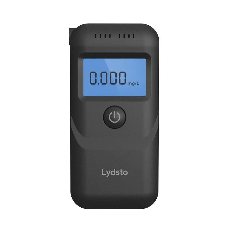 Black household alcohol tester with digital display for breath checking and drunk driving prevention
