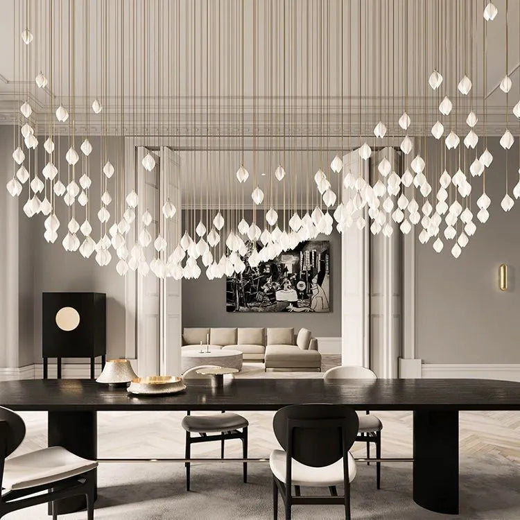 Ceramic magnolia coloured single-head pendant light with petal chandelier design.