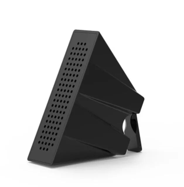 Mini portable phone amplifier bracket for Apple iPhone on a desktop in pink colour.