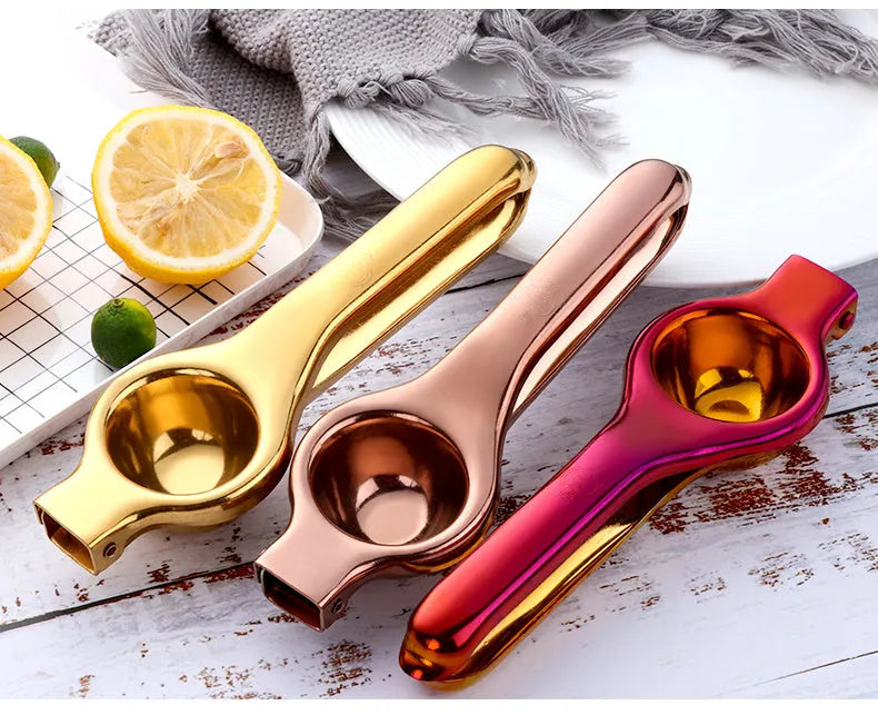 Manual stainless steel juicer Chinese style with metal body and round feed opening in gold finish