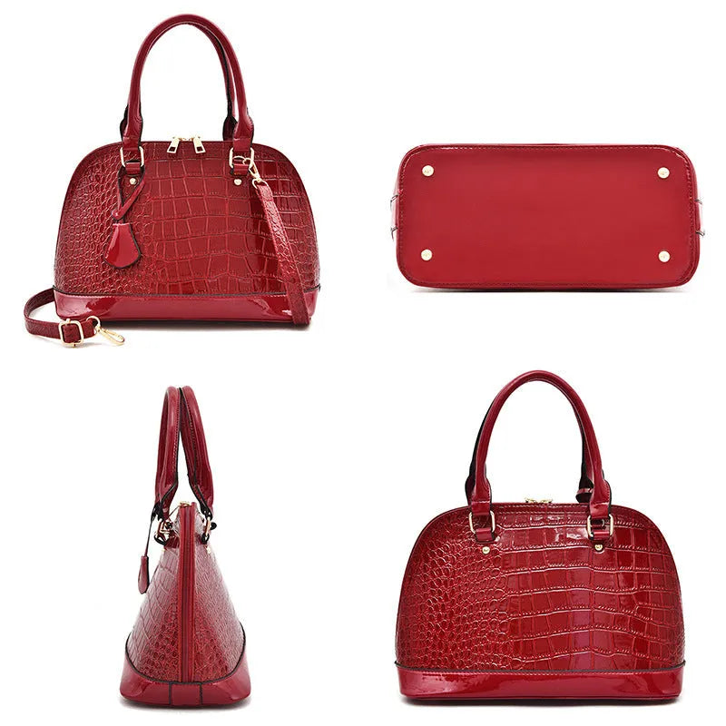 Shiny PU leather crossbody shoulder bag in structured shell shape design showing black colour option
