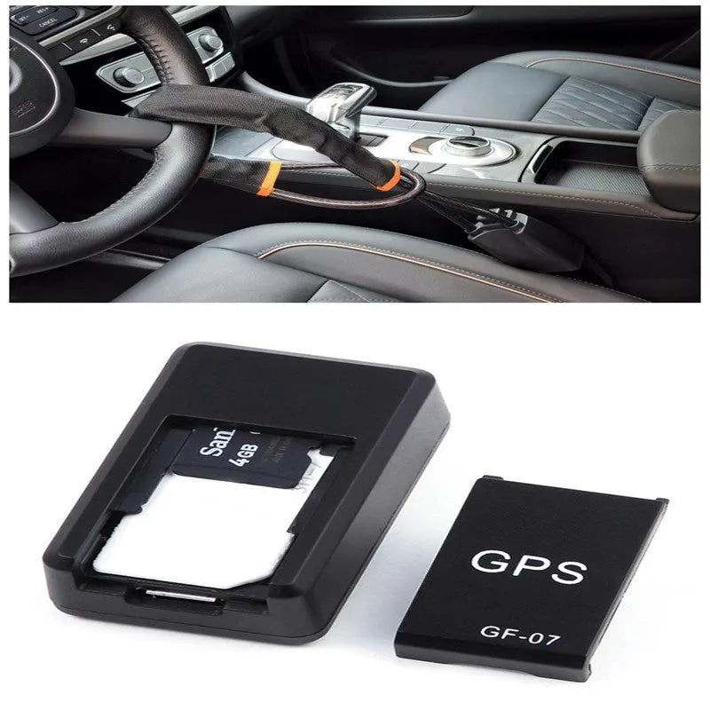 Black plastic magnetic GPS car tracker device measuring 35x20x14mm with USB charging cable