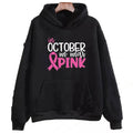 Retro graphic 'I'm A Survivor' slogan pullover hoodie with side seam pockets in pink colour.