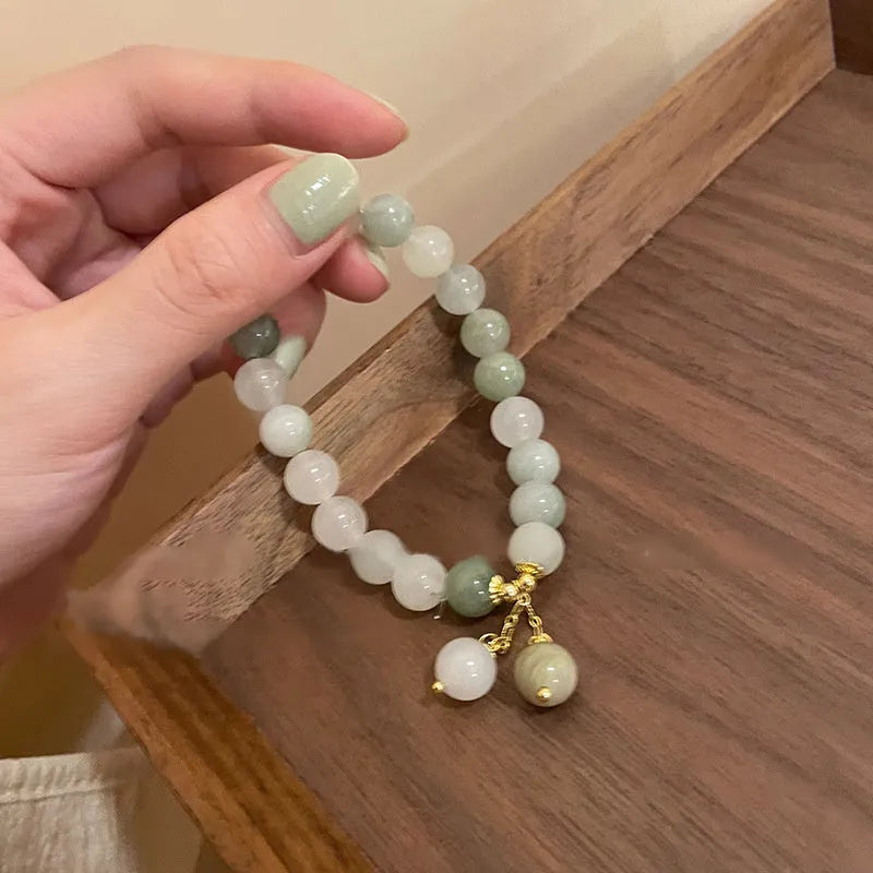 Handmade multi-layer beaded bracelet with small rice-shaped beads in white round bead style for women