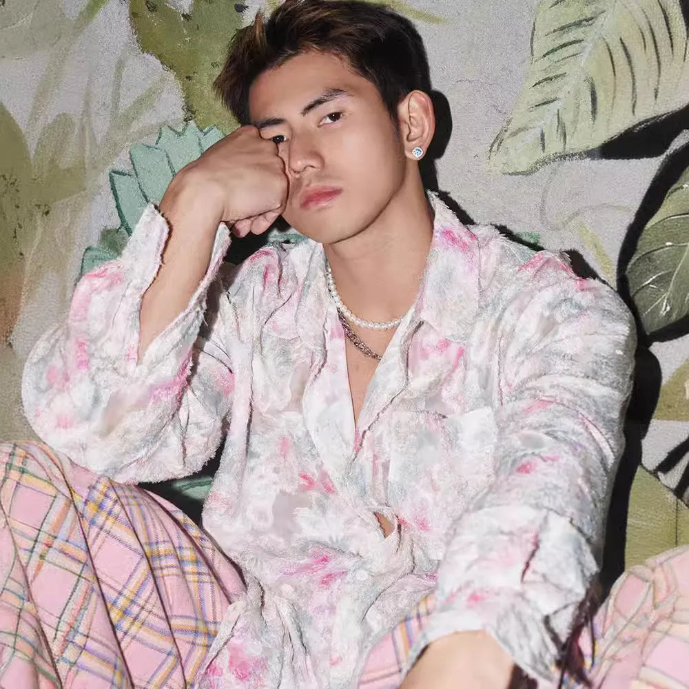 Embossed floral pattern shirt in chemical fibre blend fabric with loose fit and long sleeves