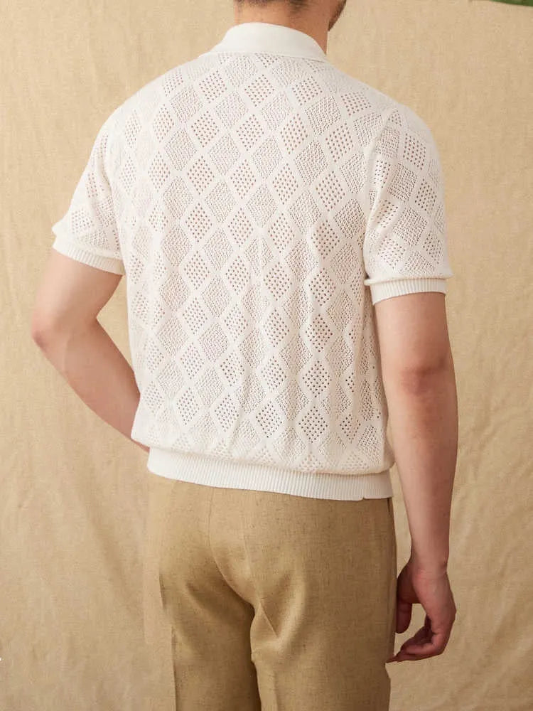 Light coffee coloured zip-front cardigan with short sleeves and a lapel collar laid flat.