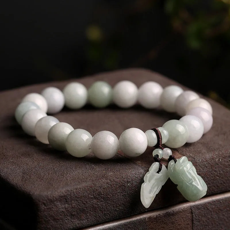 Natural jade bracelet with geometric hanging design and Buddhist elements including Maitreya Buddha motif
