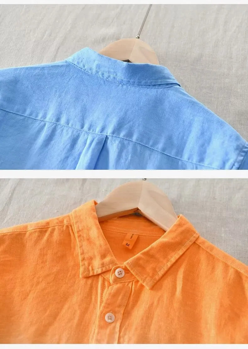A casual dark blue loose top coat with a slim fit, shown on a hanger.