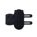 Silicone cat grooming comb with adjustable strap mounted on a table leg, shown in assorted colours.