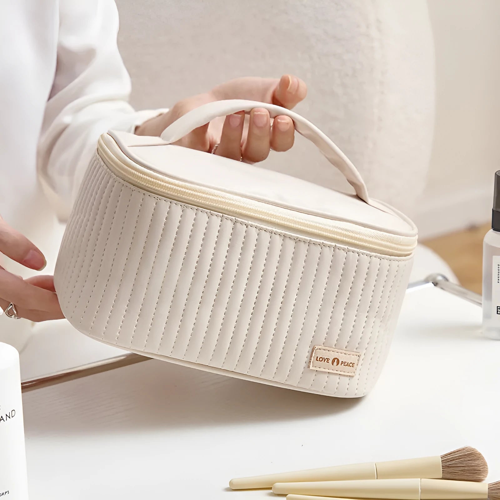 Open-top cake-shaped women's makeup bag in PU leather, shown in a choice of six solid colours.