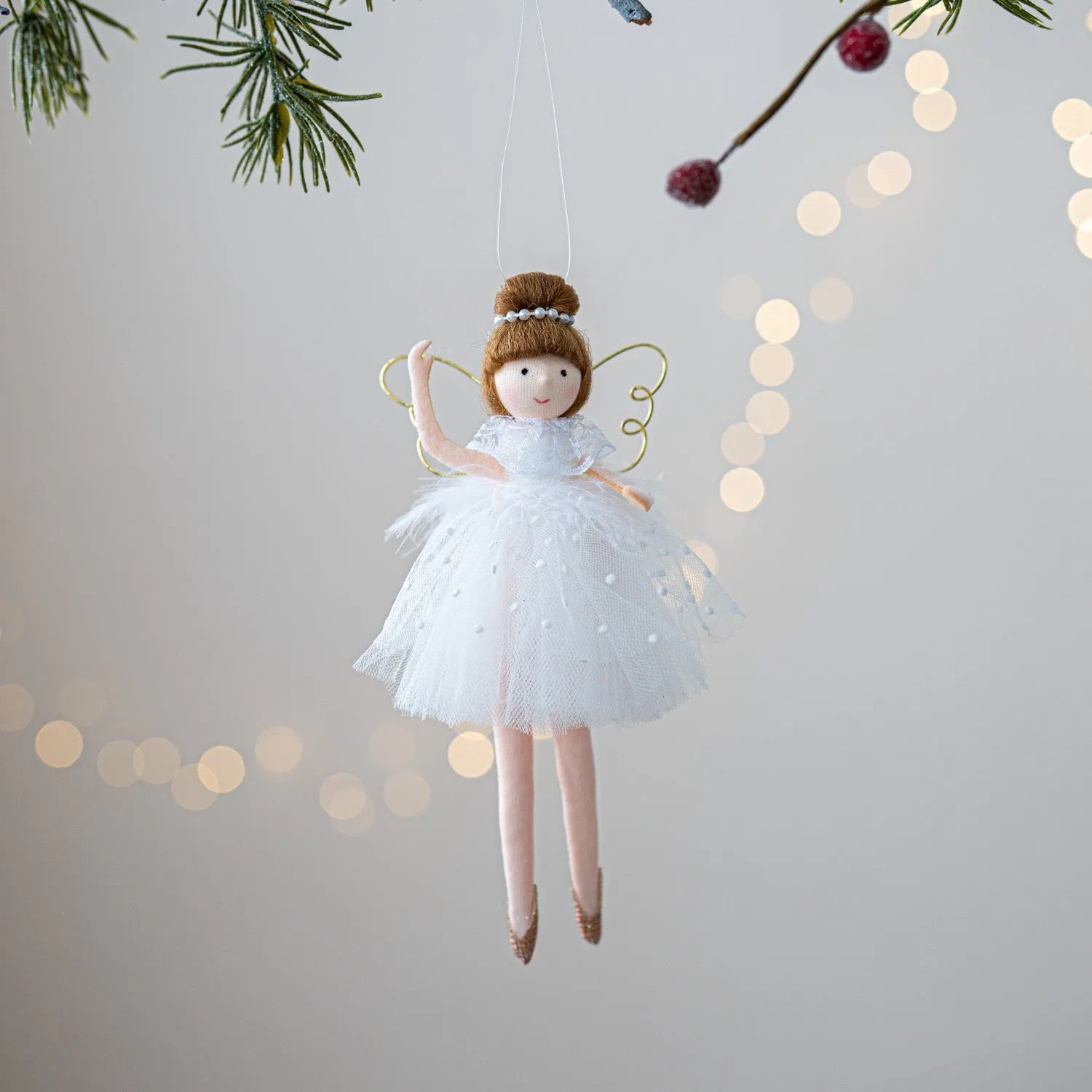 Pink and white cloth plush ballet girl angel doll pendant charm on a bag.