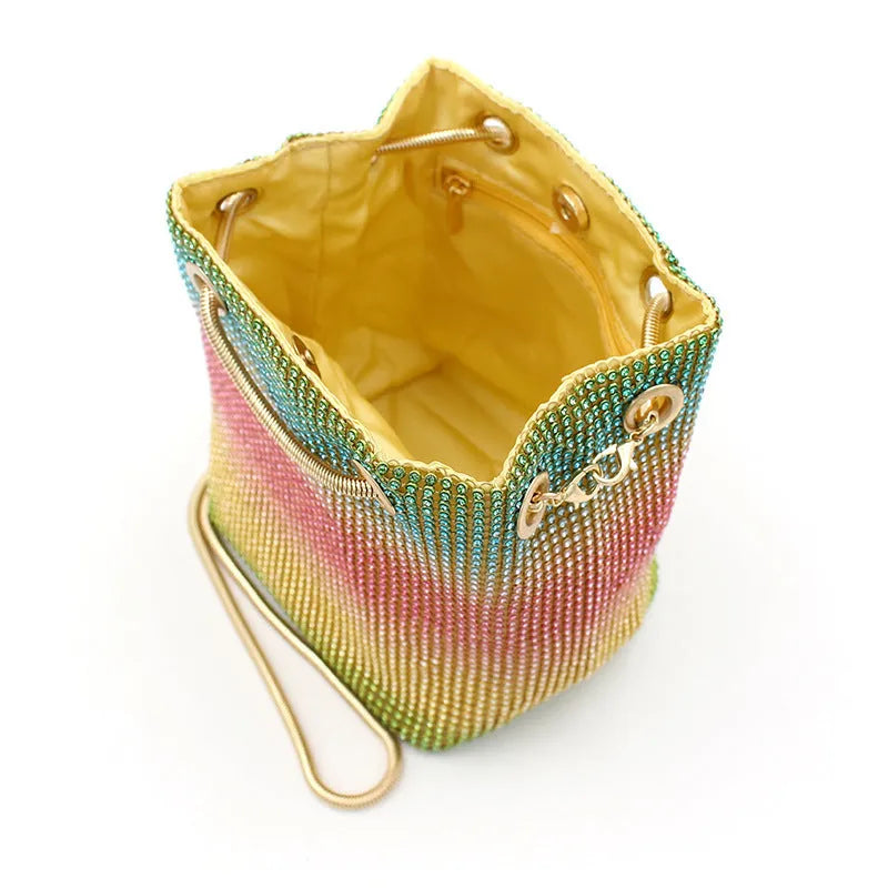 Rainbow rhinestone bucket bag with all-over diamond decoration and soft fabric texture