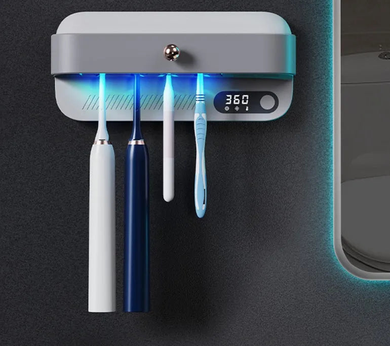 White wall-mounted smart toothbrush steriliser holder with UV light and USB charging port.
