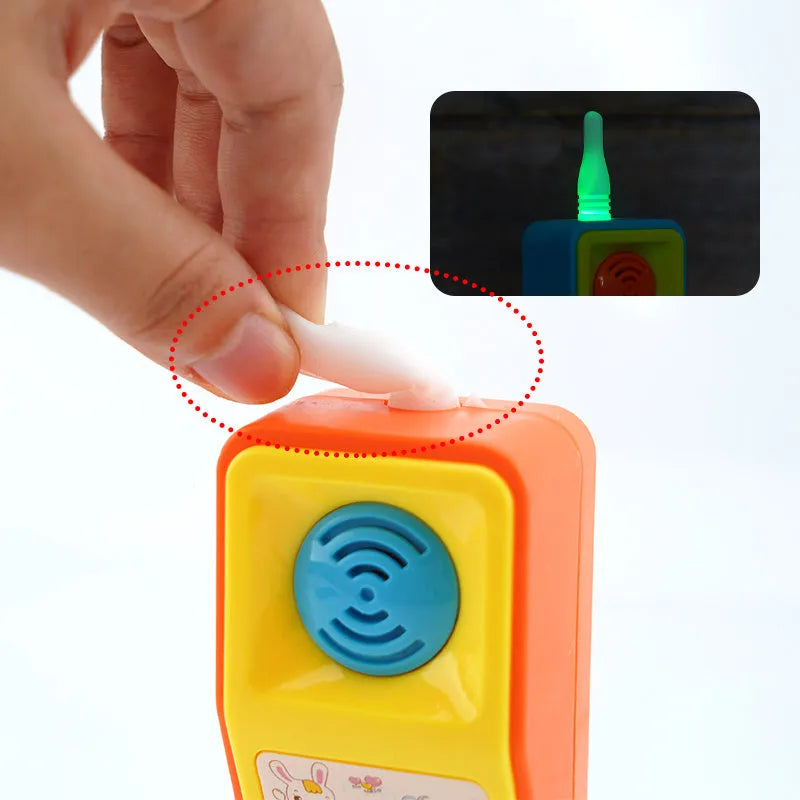 Children's sound and light educational toy with cartoon animal design showing colourful buttons and lights