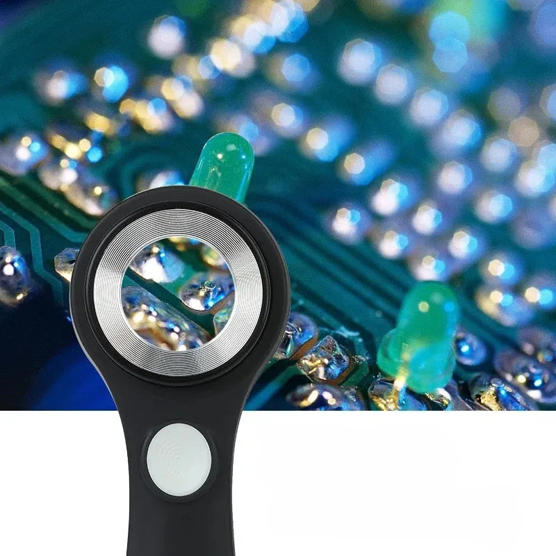 Black and silver metal 30x magnification appraisal magnifying glass with optical glass lens and USB C cable.