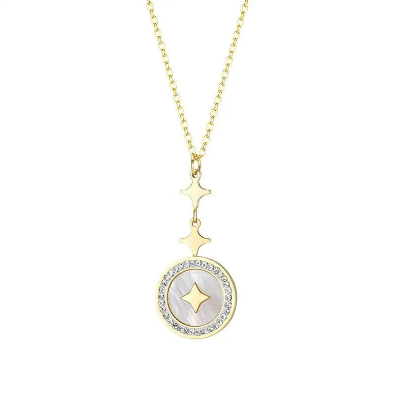 Gold titanium steel necklace with six-pointed geometric star pendant on an O-ring chain.