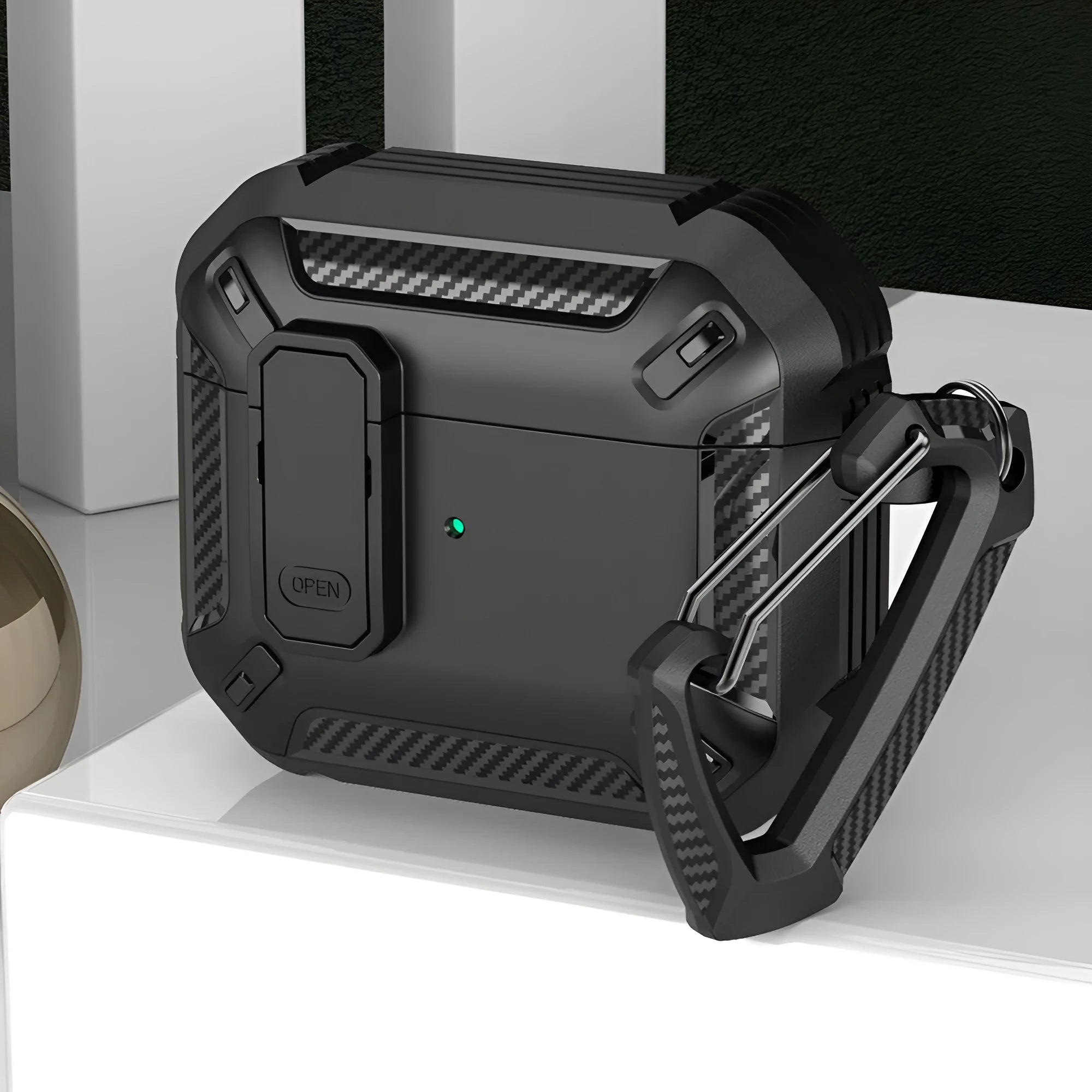 Plastic clamshell protective case for Apple AirPods with a detachable metal hook in two-tone black and blue colour.