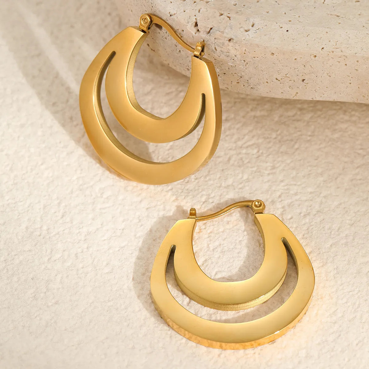 Pair of 18K gold plated geometric stainless steel French earrings with round ring minimalist design for women