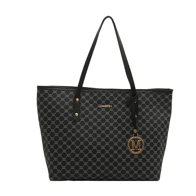 Western style PU leather shoulder bag showing sewing thread detailing, 42cm wide by 28cm tall, available in black, grey, white, and brown colours