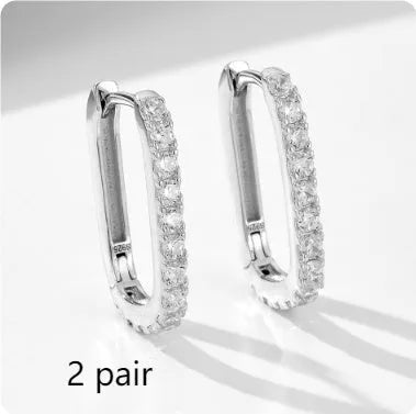 Sterling silver oval zircon ear clips with geometric quadrilateral settings