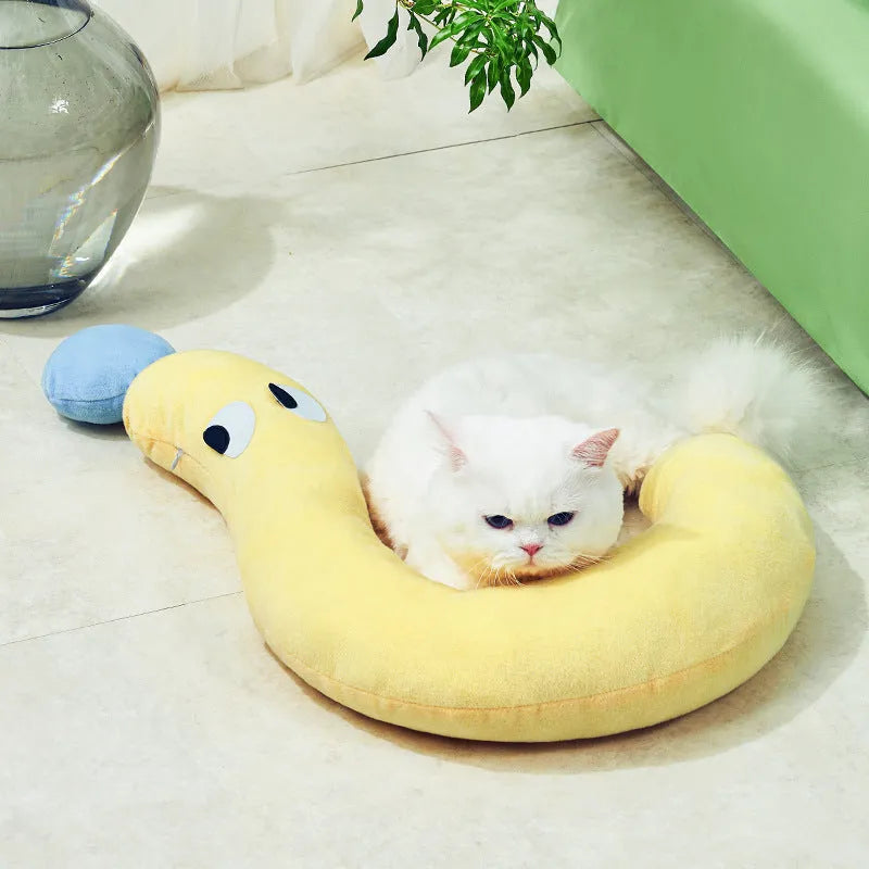 Blue and yellow rectangular pet sleeping pillow measuring 62 by 39 centimetres