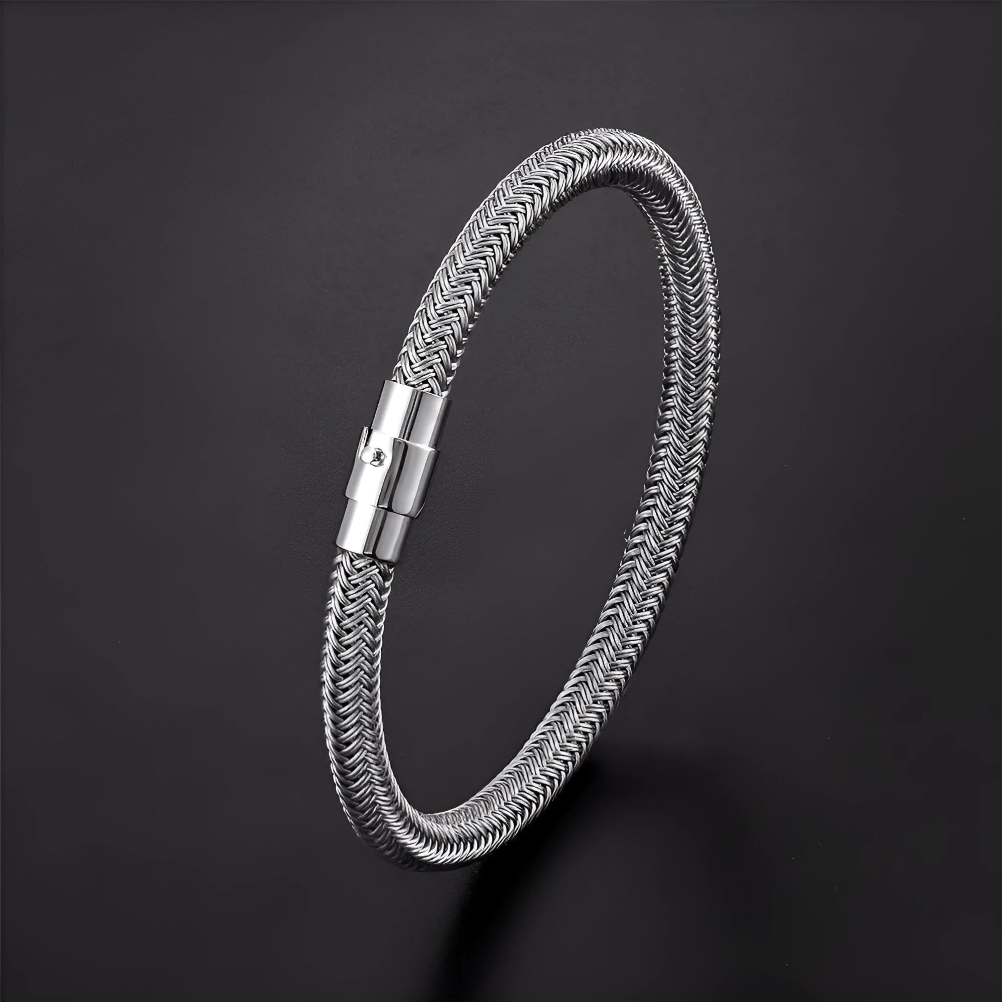 Titanium steel geometric wire bracelet with magnetic clasp shown in silver tone.
