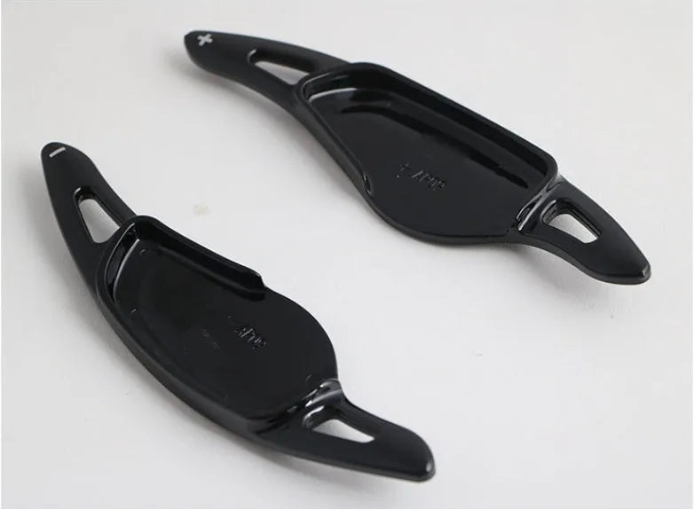 Carbon fibre steering wheel shift paddle in ABS plastic showing five colour finish options