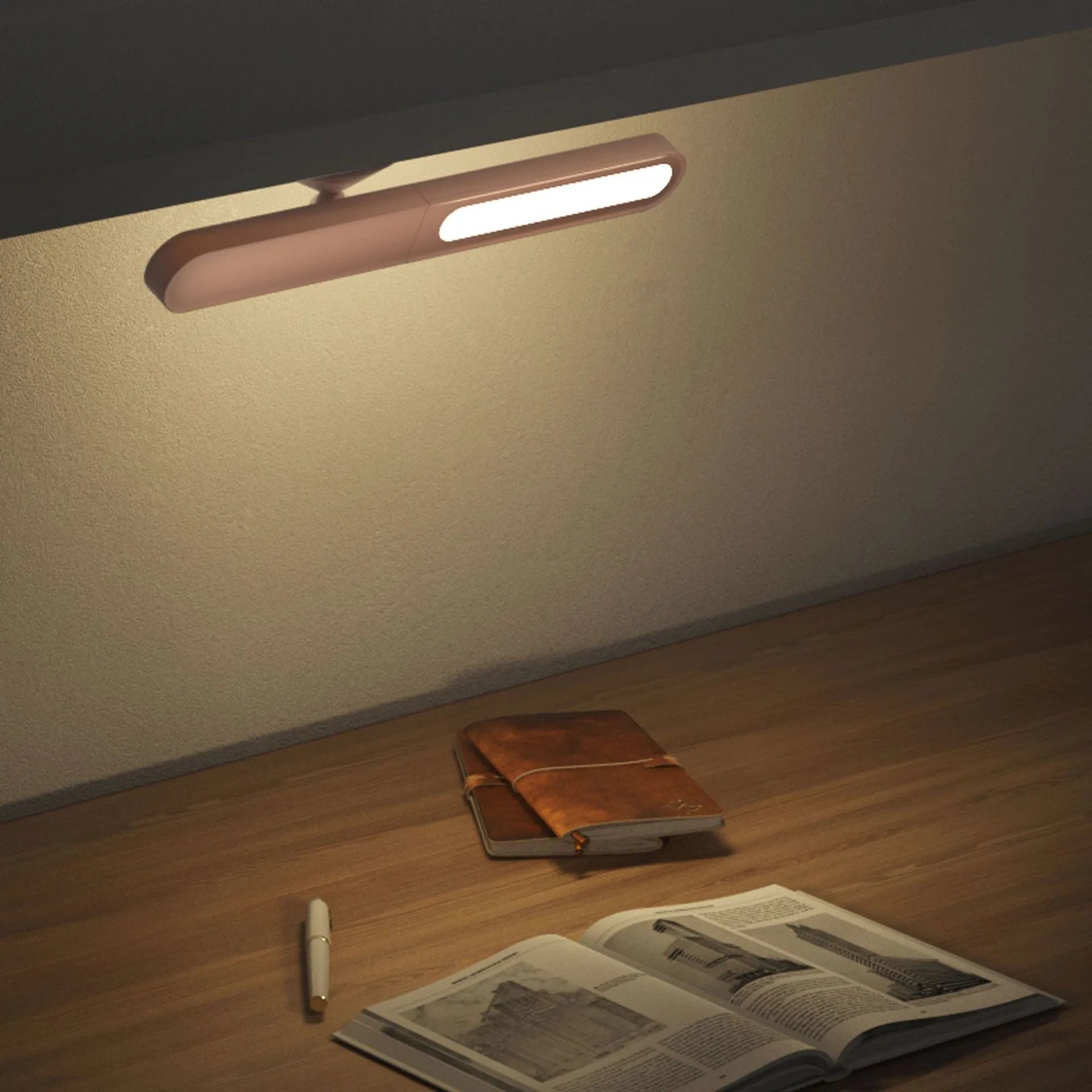 White geometric USB desk lamp with magnetic base shown on a wooden desk.