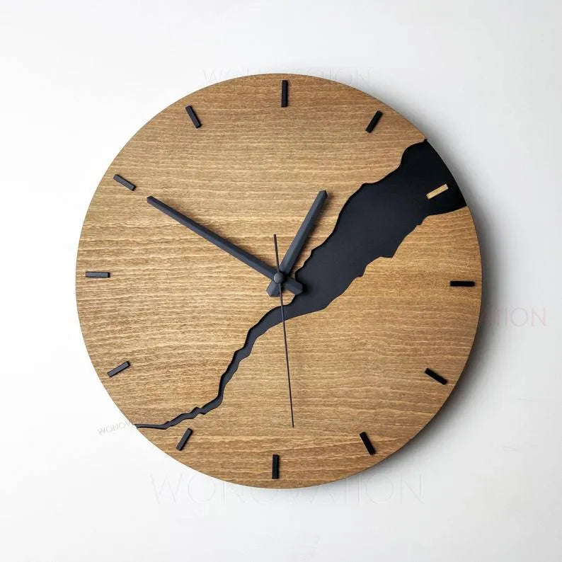 Modern wooden wall clock with creative crack pattern design on white wall