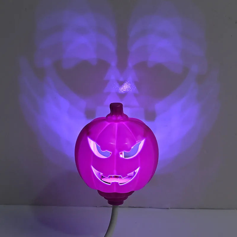 Plastic pumpkin lamp with USB charging cable in yellow or purple light colour