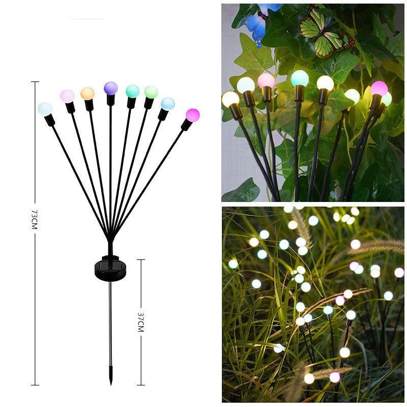 Solar-powered LED ground spike garden light with multiple heads and stainless steel soil plug.