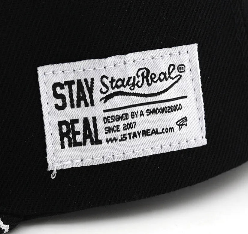 Unisex cotton baseball cap with letter embroidery available in black and white featuring adjustable dome crown design