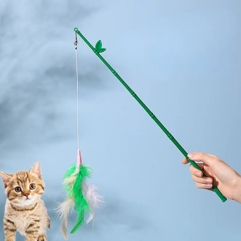 Green interactive cat feather wand toy with bells and synthetic feather attachments