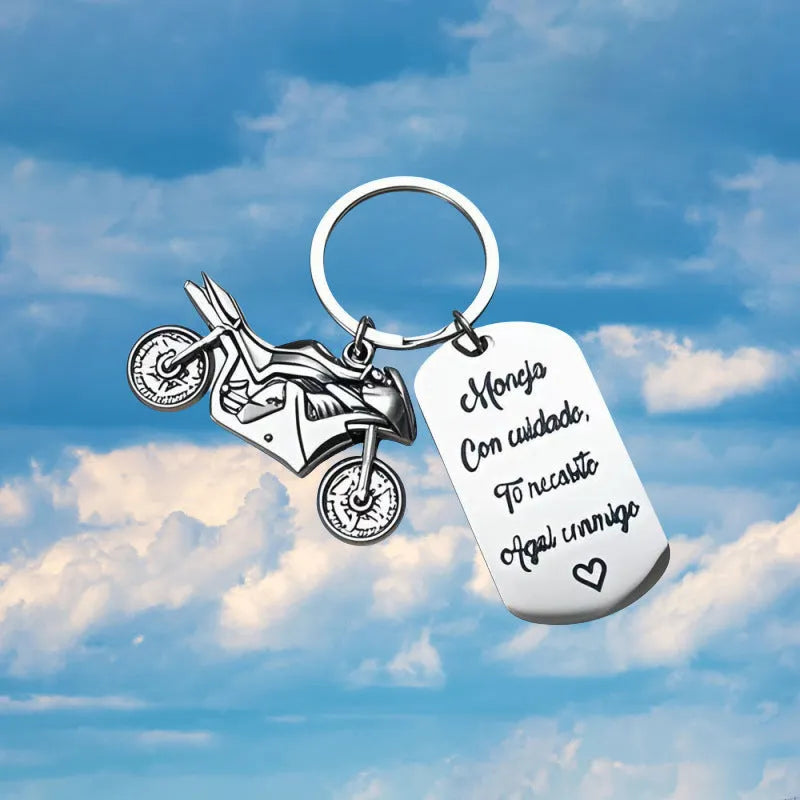 Stainless steel motorcycle key chain with inspirational design and included flannel storage bag