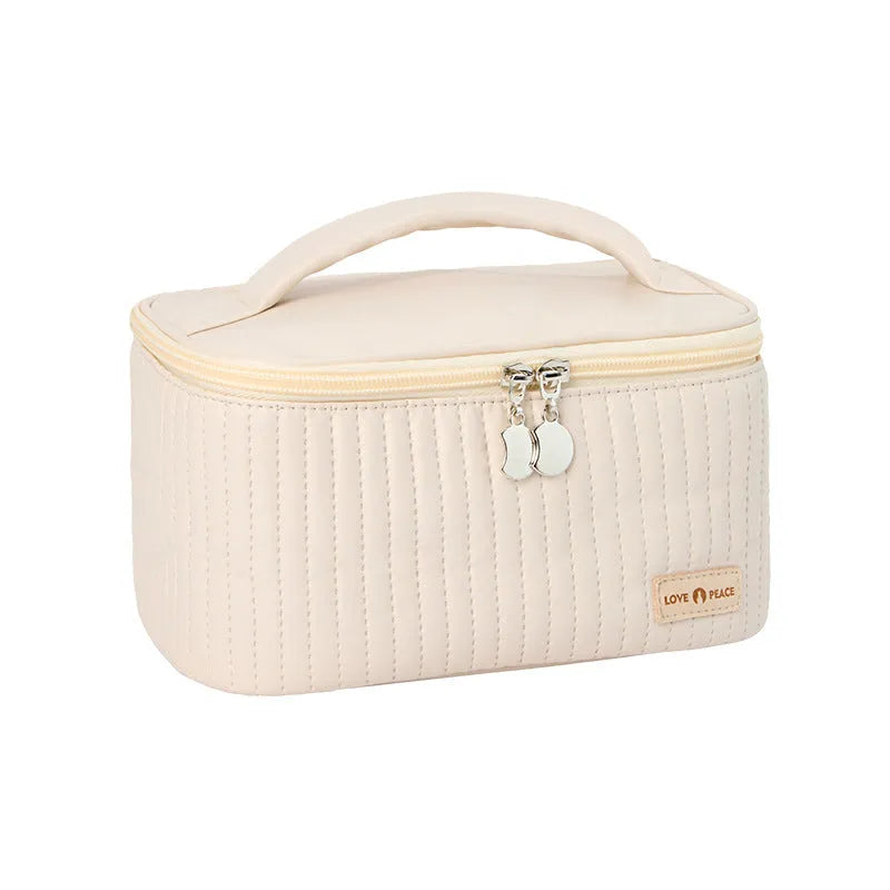 Open-top cake-shaped women's makeup bag in PU leather, shown in a choice of six solid colours.