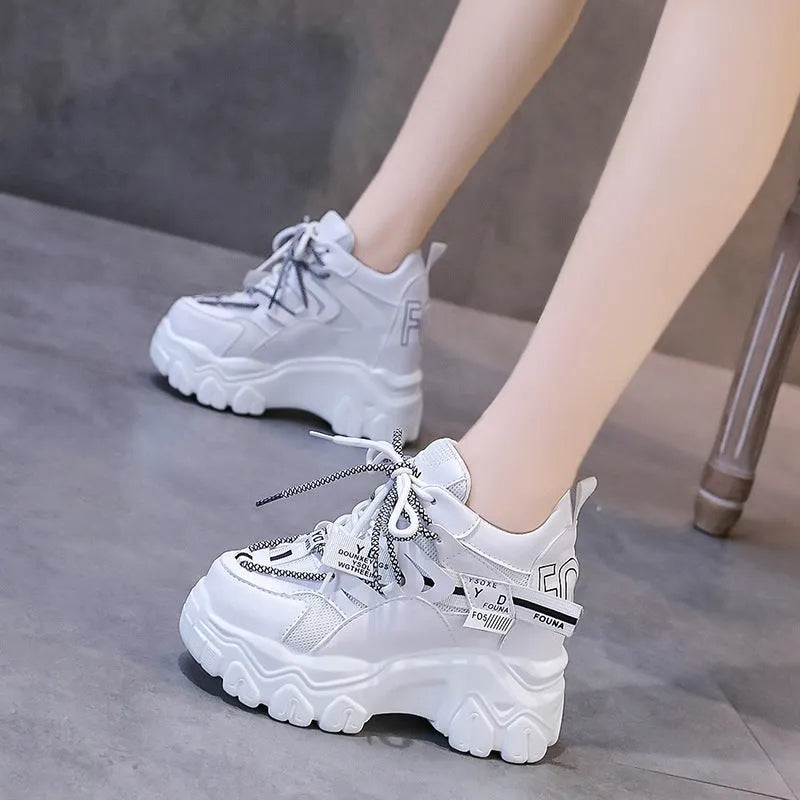 Women's white and black mesh platform sports shoes with cross-strap design and 6-8cm heel