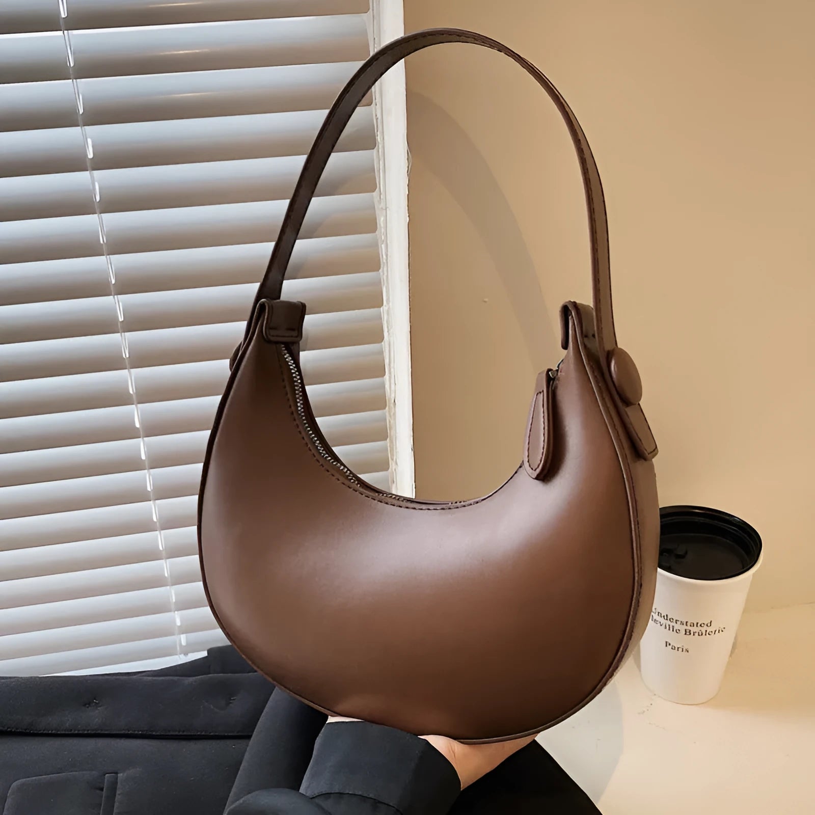 Women's retro dumpling shape shoulder bag in black with sandwich pocket design