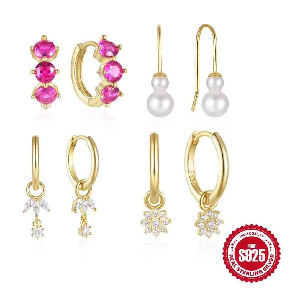 A pair of 925 sterling silver earrings with a geometric sunflower design inlaid with golden zircon stones.