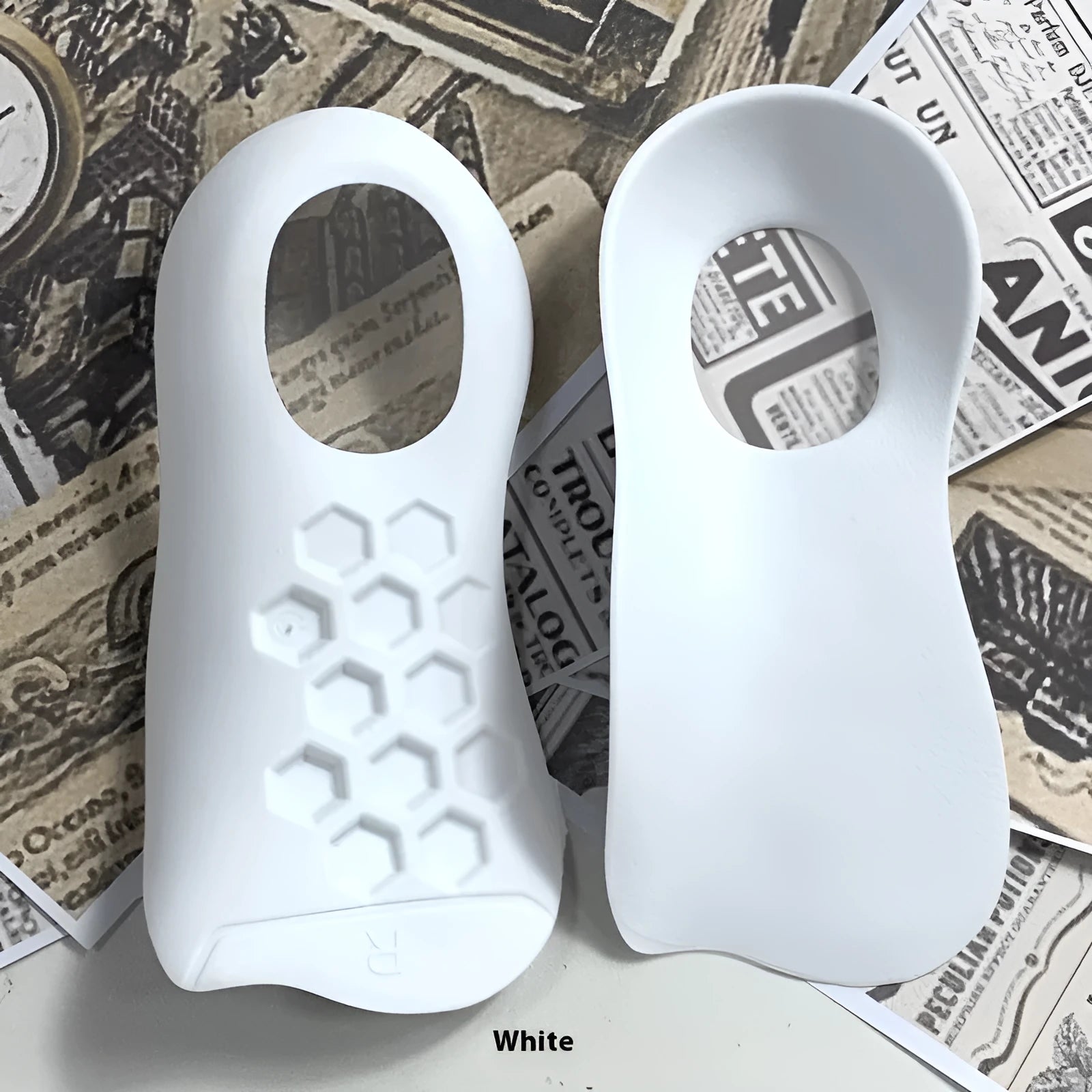TPR varus correction arch support insole in black, white, or skin colour for shoe sizes 35-45.